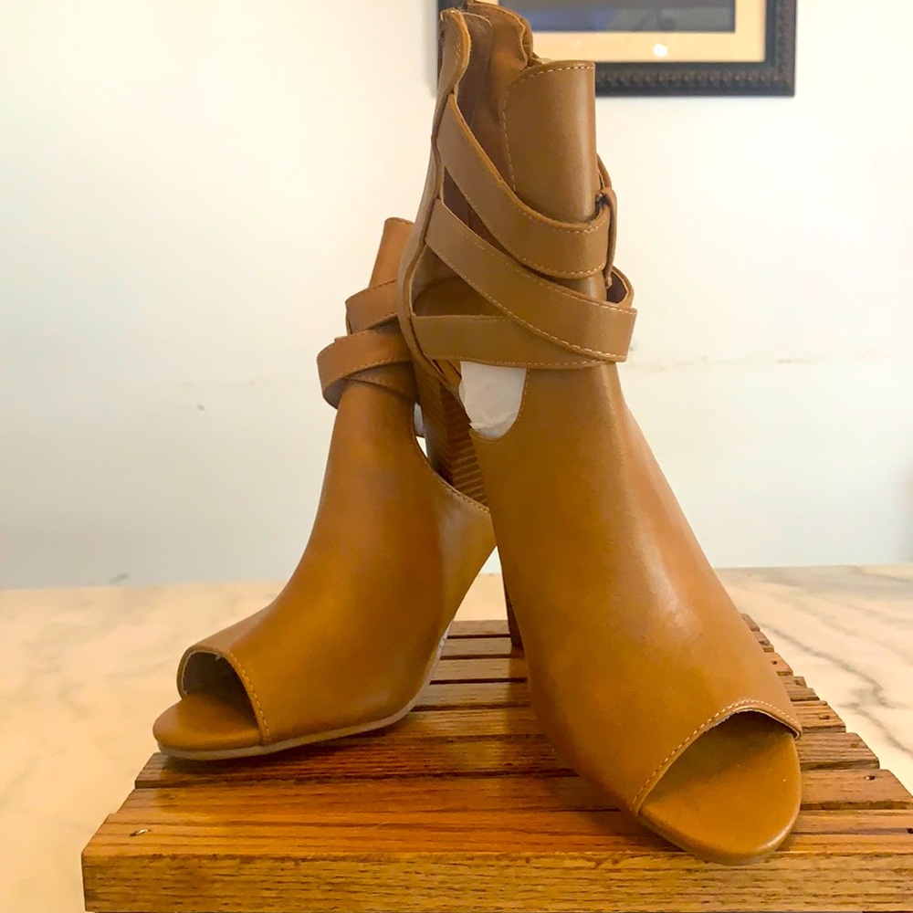 Peep toe booties. Never worn
